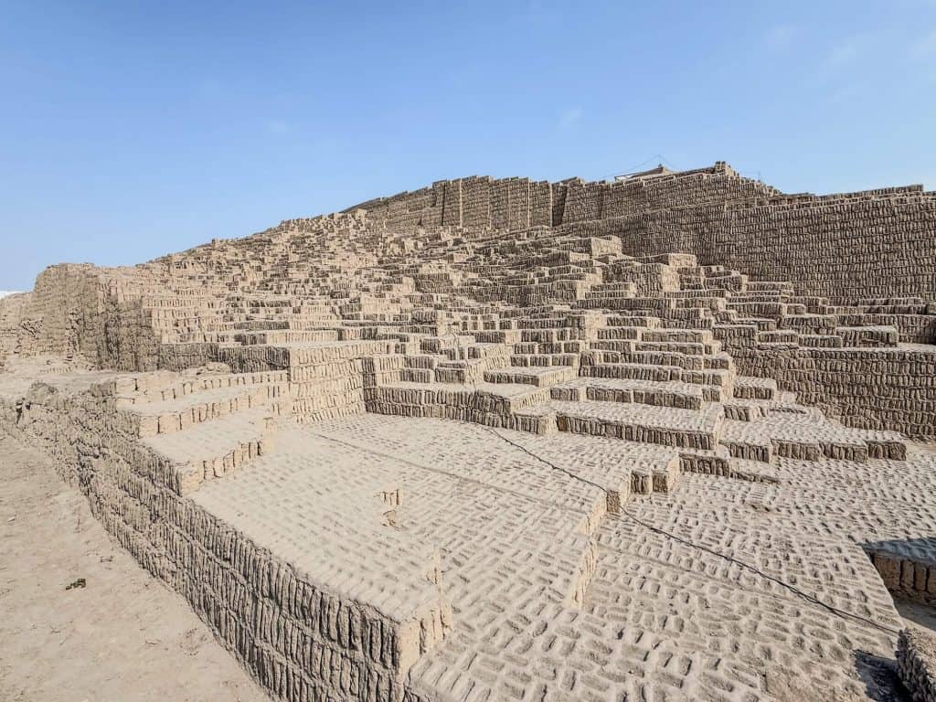 Wide view of the various levels of the adobe bricks that form the pyramid at Huaca Pucllana in Lima.